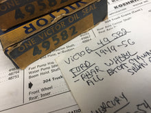 Charger l'image dans la galerie, FORD script on it Victor 49582 PAIR of oil seal rear wheel Ford 1949 50 51 52 53 54 55 56 Mercury 1952-54 Shipping include