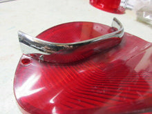 Charger l'image dans la galerie, GM used original Oldsmobile 195 57 tail lamp with chrome bar Shipping include