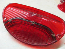 Charger l'image dans la galerie, GM used original Oldsmobile 195 57 tail lamp with chrome bar  Shipping include
