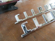 Charger l'image dans la galerie, - OEM Packard Clipper 1954 pair used namecrest emblem chrome 51 52 53 54 55 Shipping include
