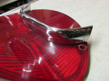 Charger l'image dans la galerie, GM used original Oldsmobile 195 57 tail lamp with chrome bar  Shipping include
