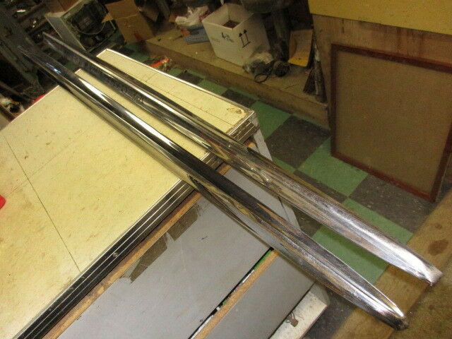 Chevrolet rear fender quarter top moulding 1957 57 pair