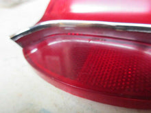Charger l'image dans la galerie, GM used original Oldsmobile 195 57 tail lamp with chrome bar  Shipping include
